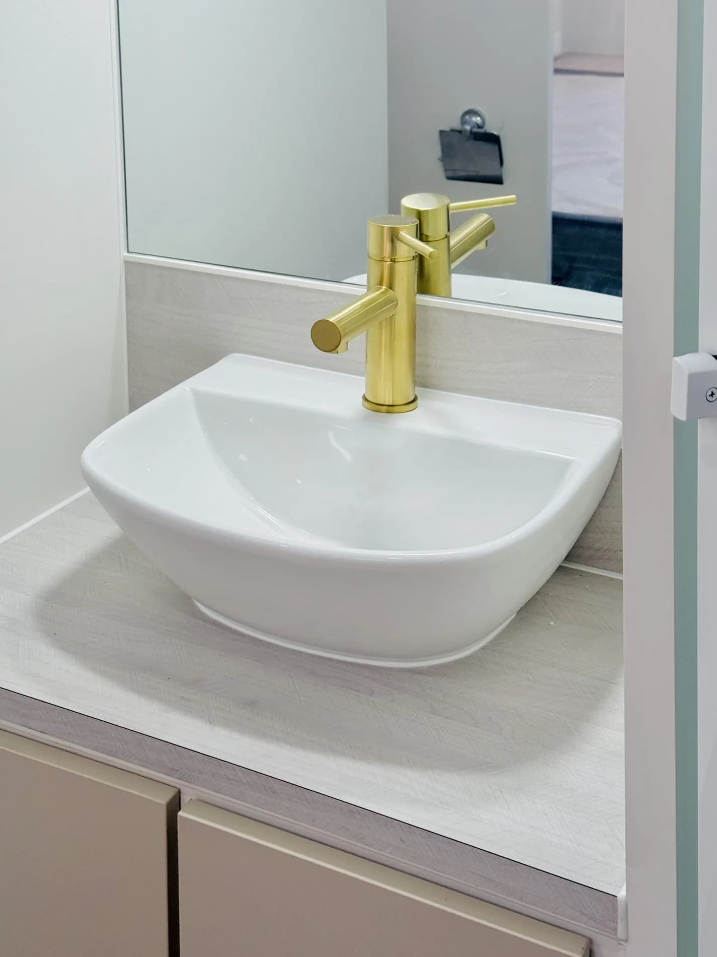 Brass vessel basin in the ensuite
